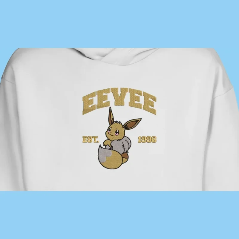 Eevee Nesting Charm | Pokemon | Sweat à capuche brodé